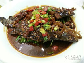 聚和园徽菜馆 品味原生态徽菜与明炉臭鲑鱼的宣城美食之旅